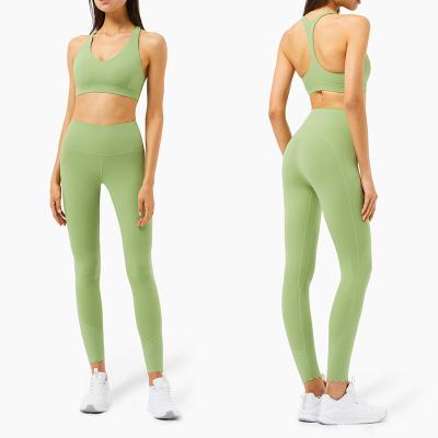 China Fashion fitness yoga breathable sports suit European and American naked beauty back gather female underwear wave cut peach pants for sale