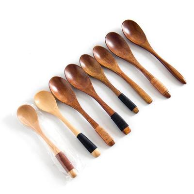 China Newest design disposable curved handle nanmu products wooden mini spoon for sale