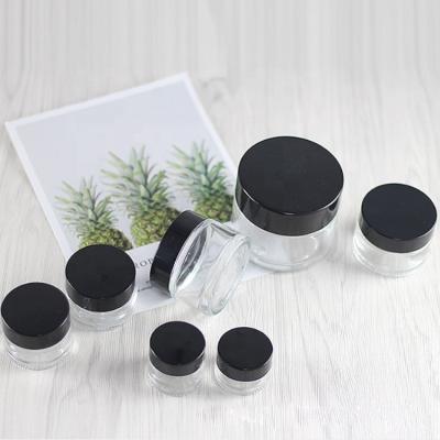 China Personal Care Custom Clear Cosmetic Jar 100ml Small Wide Mouth Cosmetic Glass Jar for sale