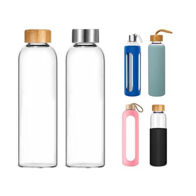 China Viable Hot Cold Detox Insulated Glass Water Bottle Of Tea With Handle Lid And Strainer Borosilicate Glass Water Bottle With Bamboo Lid for sale