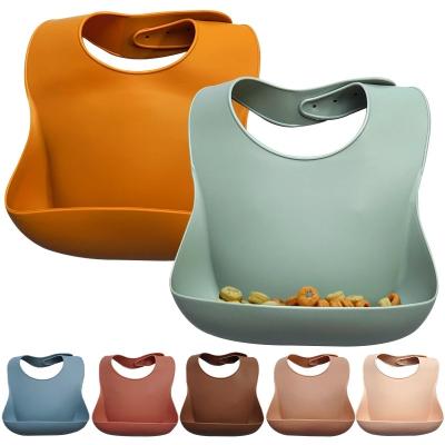 China BPA Free Silicone Baby Bibs New Waterproof Solid Newborn Infant Bibs for sale