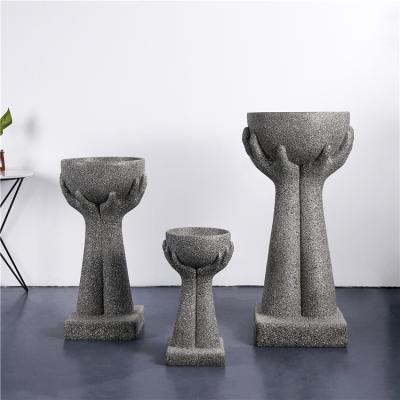 China Nordic Wholesale Unique Design Hand Shape Floor Fiberglass Outdoor Flower Plant Pots For Sale for sale