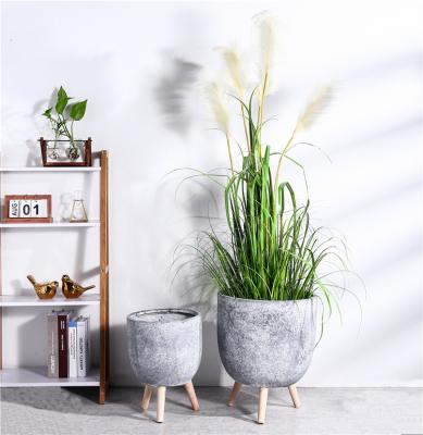 China New Arrival Rustic Decorative Floor Garden Flower Pot Large Outdoor Flower Pots And Planters With Wooden Foot for sale