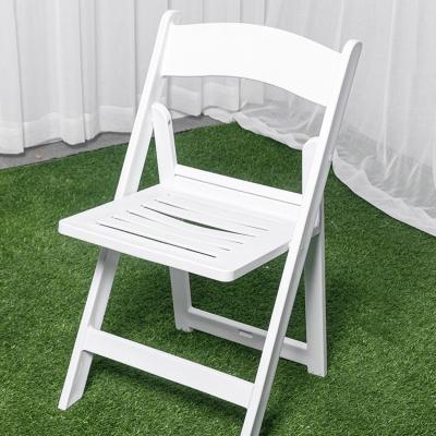 China Water Resistant Cheap White Plastic Resin Event Dining Folding Chairs Plastico Silla Wedding Chairs For Garden for sale