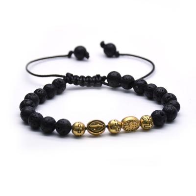 China 2022 Komi Wholesales Metal Jesus Beads Black Volcano Rock Lucky Bead Lava Stone Cross Religious Adjustable Bracelet for sale