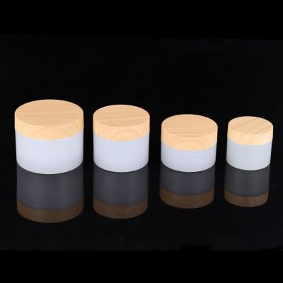 China Wholesale Custom Logo Print Cosmetic Bottle Jars Cosmetic Plastic Cream Jars With Lids for sale