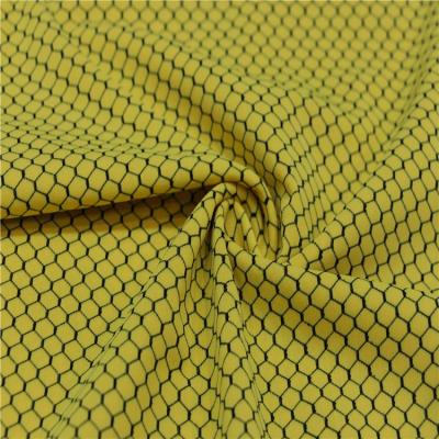 China Stretch Customized Fashion Honeycomb Fabric Spandex Anti Bacterical Knitted T Shirts Fabric for sale