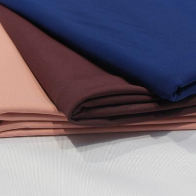 China Stretch Multiple Colors Choose 77% Polyester 23% Spandex Stretch Interlock Brushed Fabric For Yoga Leggings for sale