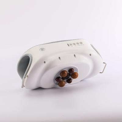 China Wholesale Hand Abdomen Hand Massage Machine Wireless Device Vibrating Bian Stone Electric Hand Massager Instrument for sale