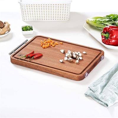 China Universal Home Disposable Acacia Wood Quick Kitchen Cutting Board With Handle for sale