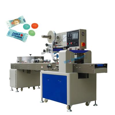 China Automatic CLOTHING Small Bag Packing Machine Soft Candy Pack Machine for sale