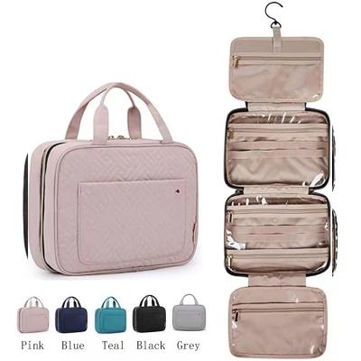 China Fashion New design Waterproof Hanging Wash Bag Travel Storage Makeup Cation Oxford Toiletry Wash Hook Cosmetic Bag for sale