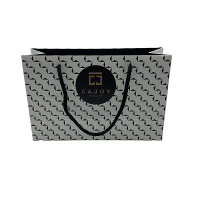 China Recyclable Custom Printed Luxury Retail Paper Shopping Bag Cardboard White Paper Bag for sale