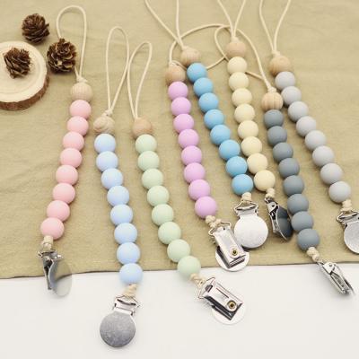 China Wholesale BPA Free Silicone Pacifier Clip Teether Beads Wooden Baby Pacifier Holder for sale