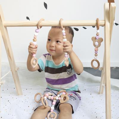 China Baby Sensory Eco-Friendly Toy Wood Foldable Indoor Activity Wooden Play Gym for sale