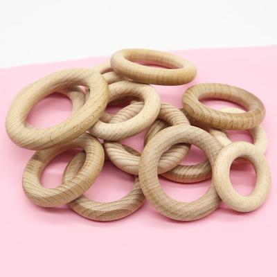 China Food Grade Circle Craft Toy Organic Chewable Teether Baby Natural Beech Wood Teether Ring for sale