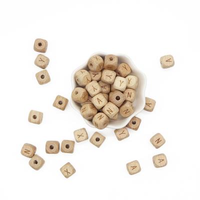 China 100% Natural Wholesale Non-Toxic Food Grade Kids Toys Letter Wooden Beads For Jewelry Making for sale