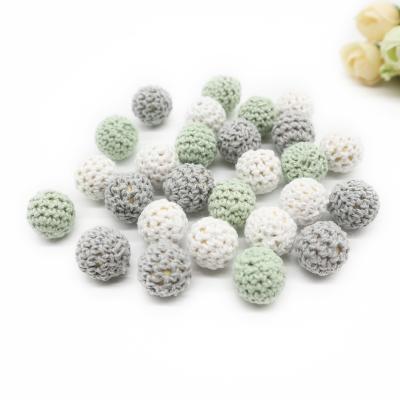 China 100% Non-Toxic Wholesale Food Grade Colorful Chewable Baby Teething Loose Round Wooden Crochet Beads for sale