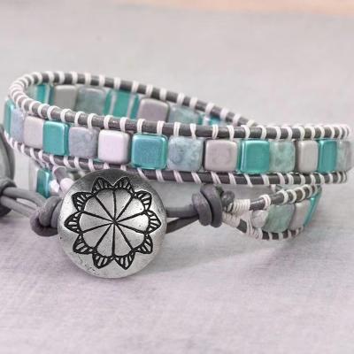 China Environmentally friendly hot selling new boho style handmade braided leather cord charm alloy pendant bracelet accessories for sale