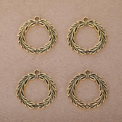 China Environmental Friendly Hot Sale Vintage Olive Branch Round Laurel Wreath Antique Gold Plated Charms Alloy Charms For Jewelry Making for sale