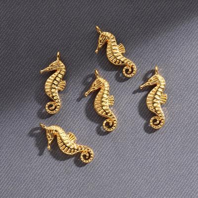 China Environmental Friendly Wholesale Animal Gold Plated Seahorse Charms Pendants Clothing Accessories Round Cutout Jewelry Pendant Accessories for sale