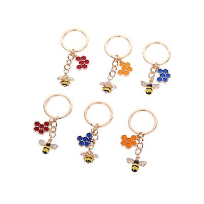 China Hot Selling Fashionable Cute Insect Alloy Enamel Bee Honeycomb Geometric Key Chain Key Chains for sale