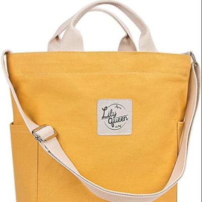 China 100% Eco-friendly Wholesale Printed Canvas Women Yellow Strong Soft Zipper Handbag Large Zipper Shoulder Bags for sale