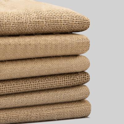 China Sustainable Wholesale Eco Friendly Qingyun Hessain Material 100% Jute Fabric Plain Roll for sale