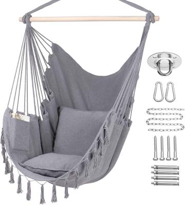 China Super Comfortable Cheap Price Cotton Rope Swing Chair Patio Garden Macrame Hammock Indoor Indoor Outdoor Hanging Chair with Wooden Bar Tassels for sale