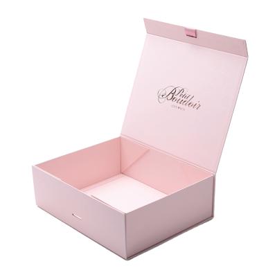 China Custom Printed Pink Paper Gift Box Magnetic Folding Handmade Apparel Cardboard Paper Packaging With Ribbon Closure for sale