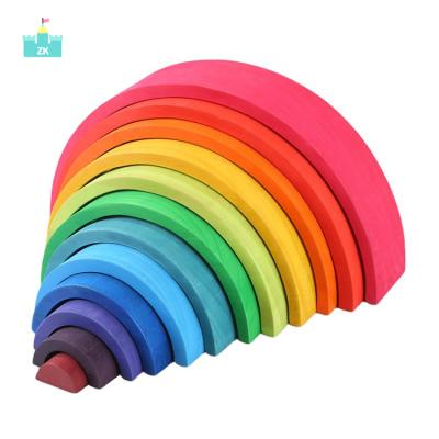 China Building Toy Game Kids Wooden Rainbow Stacker 12 Piece Montessori Wooden Rainbow Stacked Nordic Stacking Toys for sale