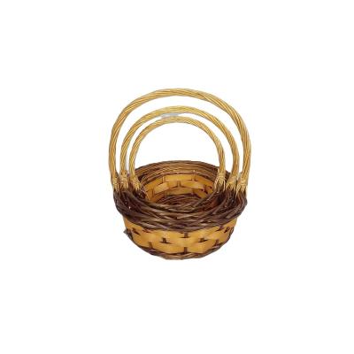 China Sustainable Set of 3 Willow Wood Waste Cheap Straw Woven Gift Baskets With Handles Fruit Picnic Shopping Baskets Wholesale Basket Storage for sale