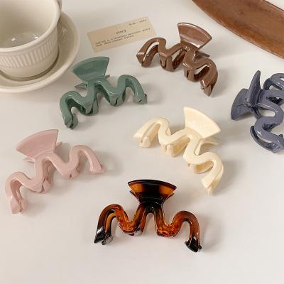 China Headwear Hair Claw Solid Color Geometric Hair Clips Elegant Ladies Headwear Hair Clip Fashion Hair Accessories for sale