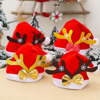 China Picture Christmas Hat Cartoon Elk Antlers Child Adult Christmas Hats With Decoration Santa Dress Up Christmas Party Bowknot Hats for sale