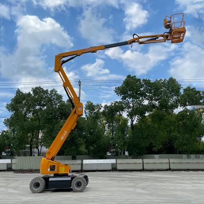 China Building Material Shops Hydraulic Boom Lift Hinged Top Quality 14m Towable Elevated Aerial Work Platform Self Propelled Platform Lift for sale