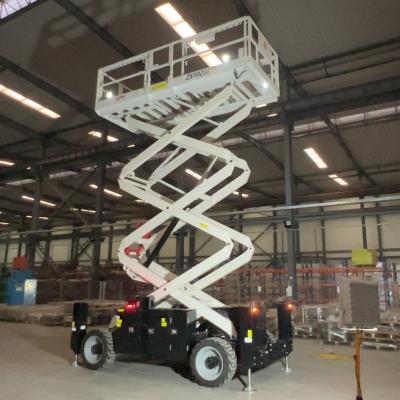 China Building Material Shops New Design Diesel Engine Drive Rough Terrain Scissor Lift Self Propelled Crawler Aerial Work Platform For Building Construction for sale