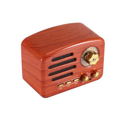 China New Grain Radio 2021 Retro Retro FM Radio TF Wooden Card Subwoofer Mini Wireless Speaker for sale