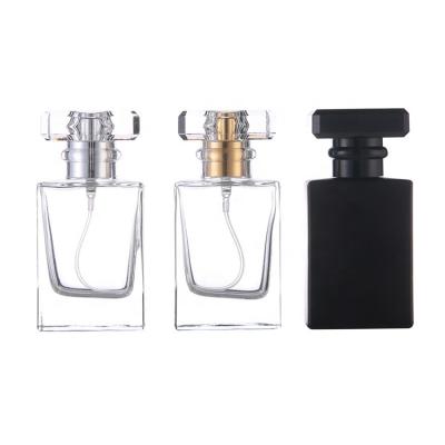 China 30ml/1oz Refillable Perfume Bottle Luxury Clear Empty Square Perfume Pump Sprayer Glass Bottle for sale