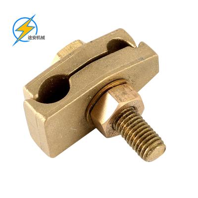 China Double Copper Tape Clamp groove grounding connector price en venta