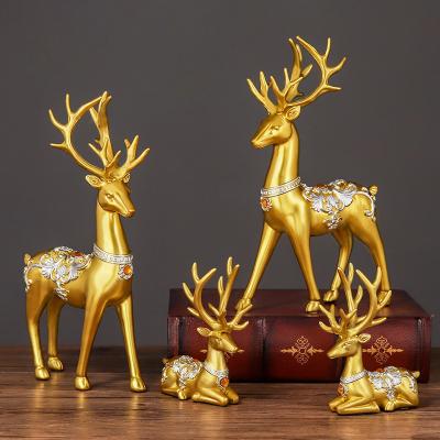 China Nordic Rustic Style Elk Gold Painted Deer Resin Crafts Luxury Decoration Accessories Home Decor for sale