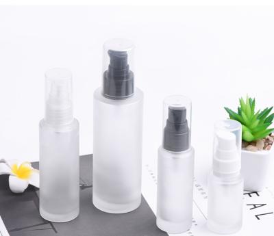 China Wholesale Personal Care Lotion Bottle 20/30/50/100ml Glass Bottle Frosted Glass Bottle With Lotion Pump And Clear Cover for sale