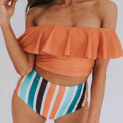 China 2022 summer fashion breathable women plain high waist swimsuit ruffled top and striped swimwear for sale