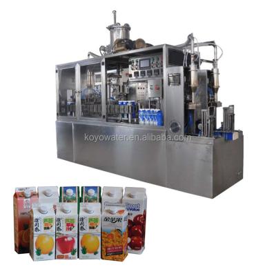 China Triangular Beverage Cartons Filling Machine With Plastic Pour Spout for sale