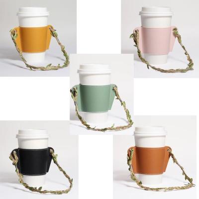 China Viable Hot Sale Custom Amazon Mug Holder Coffee Mug Sleeve PU Leather Cup Holder With Portable Rope for sale