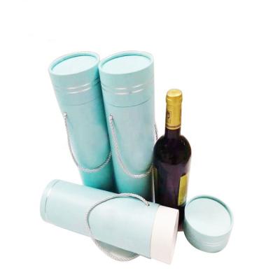 China Customized Recyclable Blue Airtight Packaging Cylinder Wine Package Kraft Paper Tube Box With Rope for sale