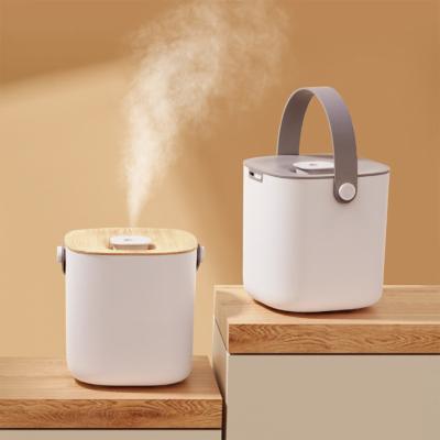 China Newest Wood Air Diffuser 600ml Battery Operated Chargeable Electric Aroma Oil Humidifier Outdoor for sale