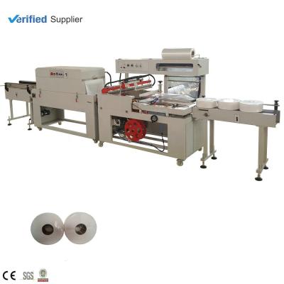 China Automatic Industrial Food Roll Maxi Roll Paper Seal Shrink Machine From Xinda for sale