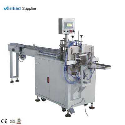 China Semi-automatic Pocket Tissue Packing Machine Tissue Facial Tissue Packer for sale