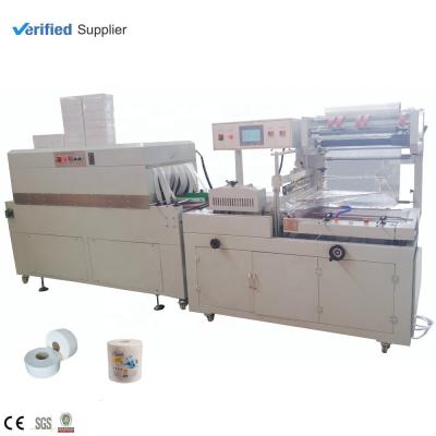 China Maxi Tissue Roll Sealing Film Chemical Automatic Shrink Paper Wrapping Machine for sale