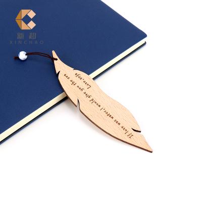 China 2020 China new design xinchao beech graduation gift custom wood carved bookmark for sale